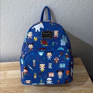 Loungefly Disney Parks Character Print Blue Backpack